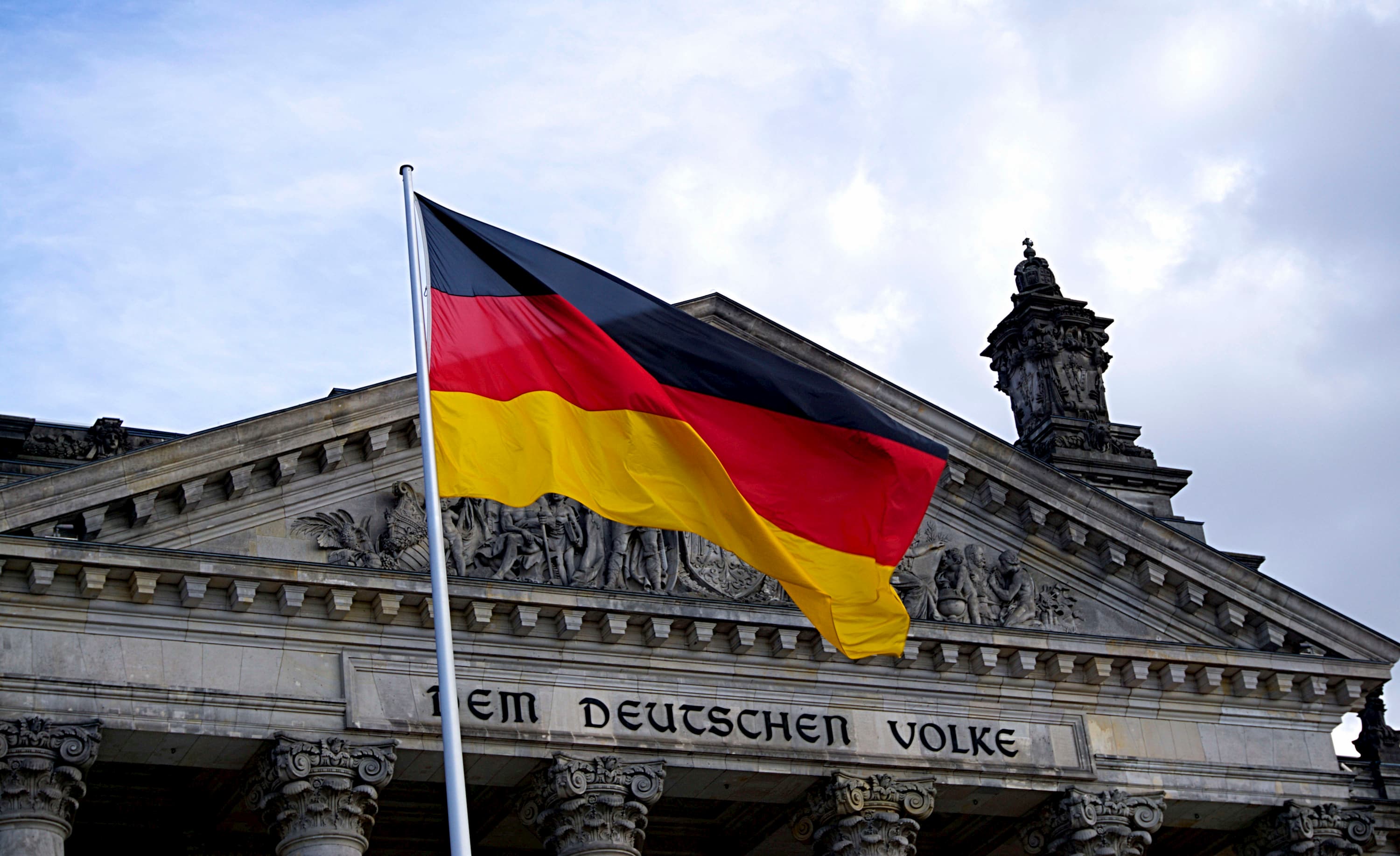Canva Germany Flag In Front Of Building (2)